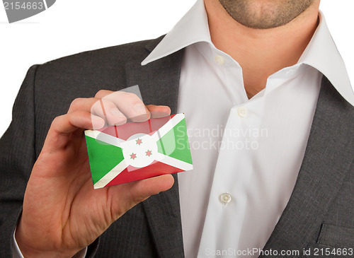 Image of Businessman is holding a business card, Burundi