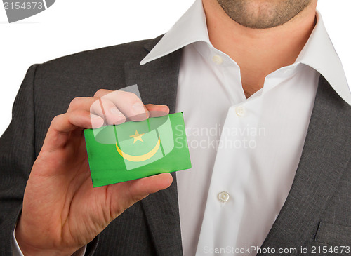 Image of Businessman is holding a business card, Mauritania