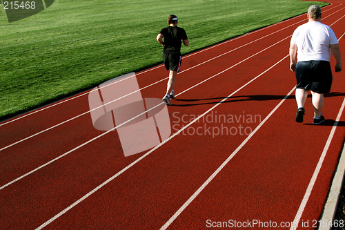 Image of Couple On A Racetrack