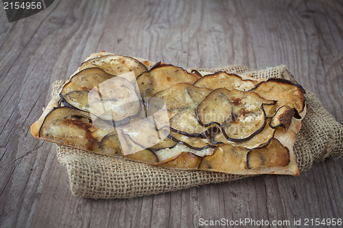 Image of Sliced pizza with eggplants