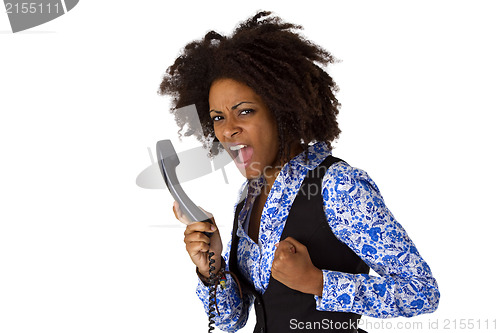 Image of Angry african american woman with handset