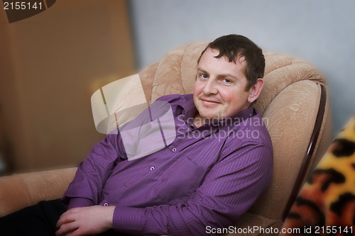 Image of Portrait of a young man in a chair