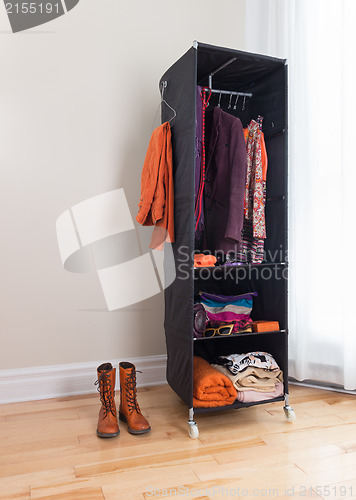 Image of Mobile clothes organizer in a room