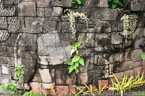 Image of elephant in old stone wall