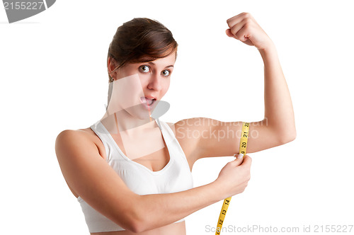 Image of Shocked Woman measuring her Biceps