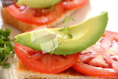 Image of Avocado On Tomato