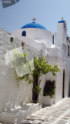 Image of greek church with  green tree