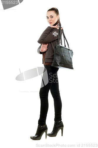 Image of Pretty brunette with a bag
