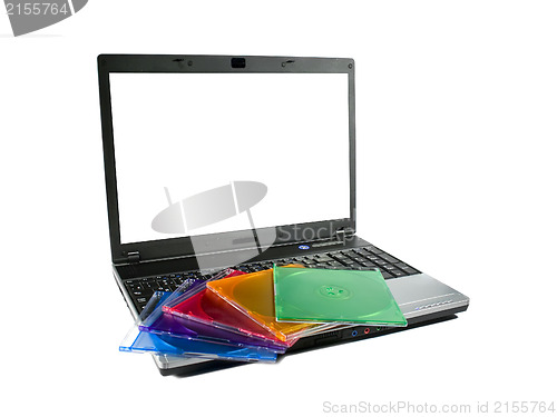 Image of Colored cd`s on a laptop