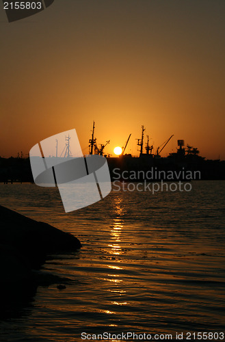 Image of Several ships at sunset