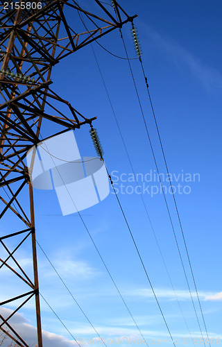 Image of Electric pylon with a blue sky background