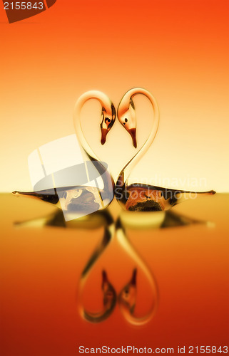 Image of St. Valentine background with two swans in love