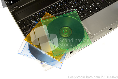 Image of Colored cd`s on a laptop