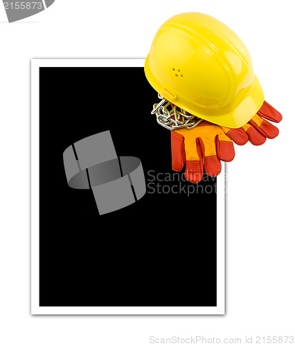 Image of Yellow hard hat and protective gloves isolated with empty frame