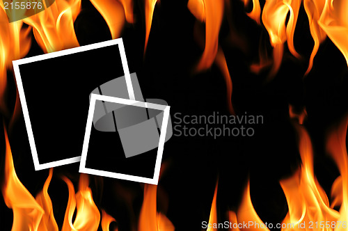 Image of Empty frames with fire flames background