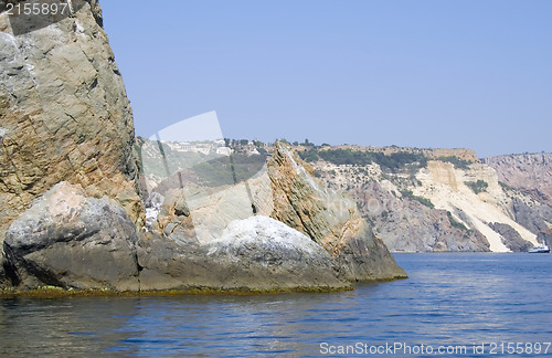 Image of Mountain on a rocky coastline.View from sea.