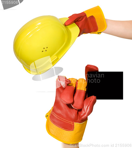 Image of Red glove holding an empty frame and glove holding a yellow hard