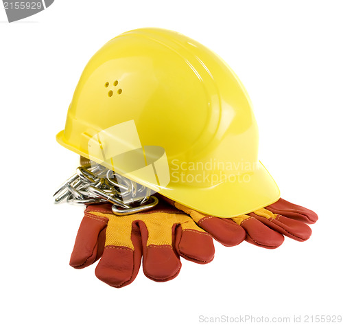 Image of Yellow hard hat, protective gloves and steel chain isolated