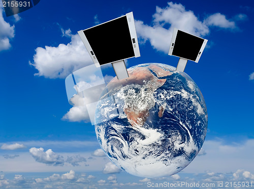 Image of Blank billboards on the earth with blue sky background