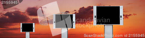 Image of Blank advertising billboards with sunset sky background