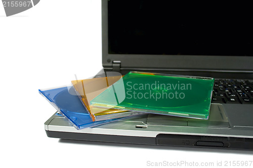 Image of Colored cd`s on a laptop