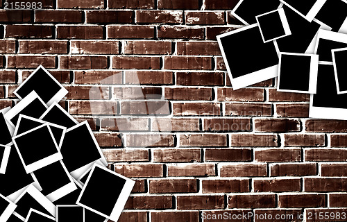 Image of Empty instant photos on grunge brick wall background