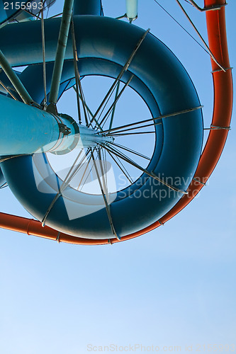 Image of Twisting, colorful water chutes wind around