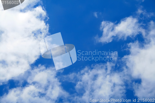 Image of Puffy clouds on blue sky