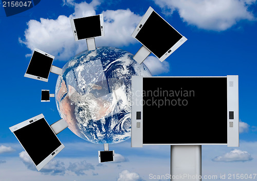 Image of Blank billboards on the earth with blue sky background