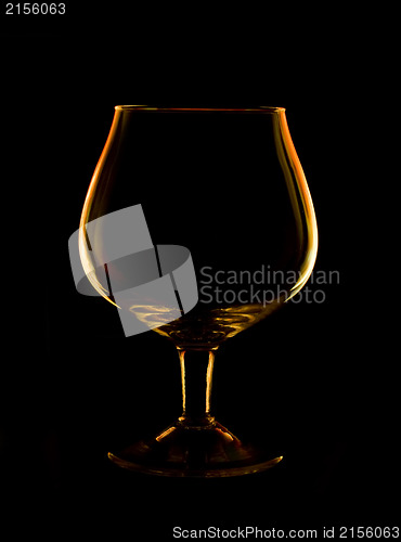 Image of Glass with orange fire flames reflection