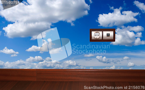 Image of Energy outlet with blue sky background