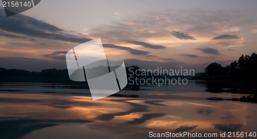 Image of Romantic sunset on the lake with fog