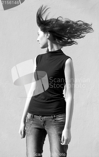 Image of Fashion portraits of a model with awesome shaking hair