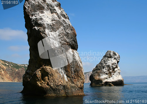 Image of Mountain on a rocky coastline.View from sea.