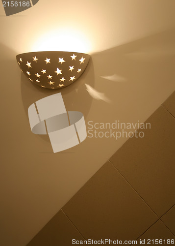 Image of Wall lamp( sconce) in a modern room