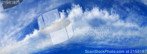 Image of Blue sky with windy clouds