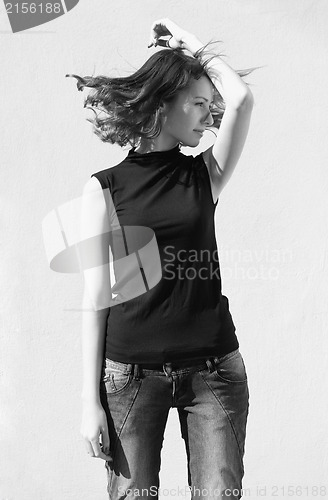 Image of Fashion portraits of a model with awesome shaking hair