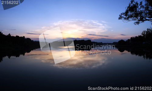 Image of Romantic sunset on the lake with fog