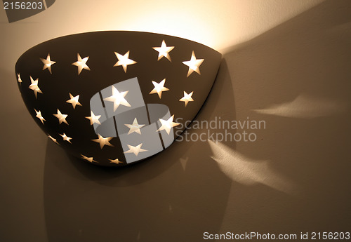 Image of Modern,abstract looking wall lamp (Sconce).