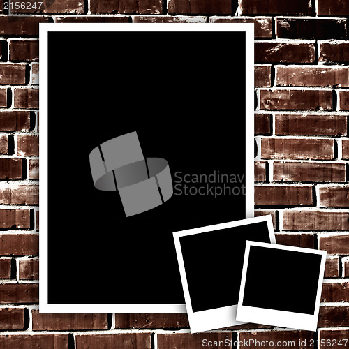 Image of Empty photo on grunge brick wall background