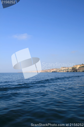 Image of Mountain on a rocky coastline.View from sea.