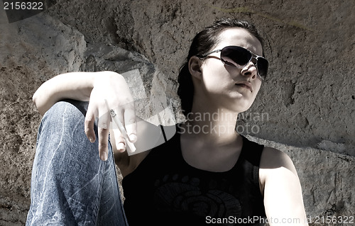 Image of Smoking a cigarette. Urban style