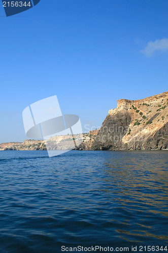 Image of Mountain on a rocky coastline.View from sea.