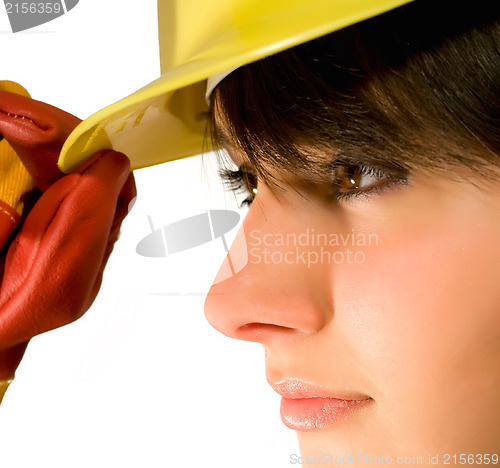 Image of Girl in yellow hard hat and red gloves