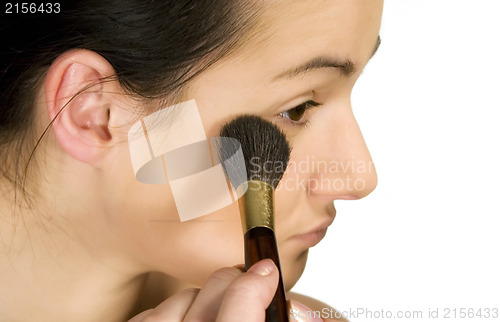 Image of Sexy girl putting make-up