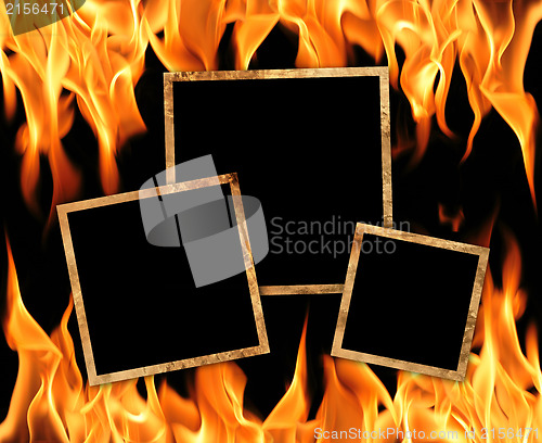 Image of Old frames with fire flames background