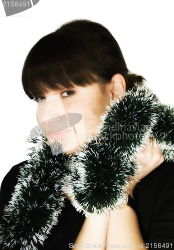 Image of Young woman with green garland