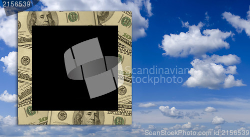 Image of Empty dollar frame with deep blue sky background