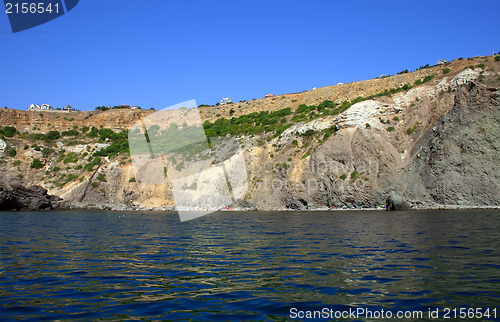 Image of Mountain on a rocky coastline.View from sea.