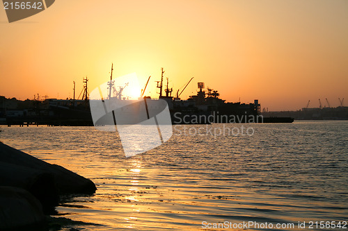 Image of Several ships at sunset